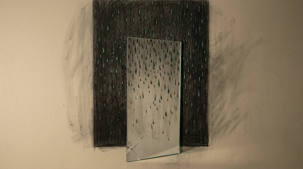 A black screen with green, plasma looking ones and zeros streaming down it, a single mirrored layer standing in front of the fall