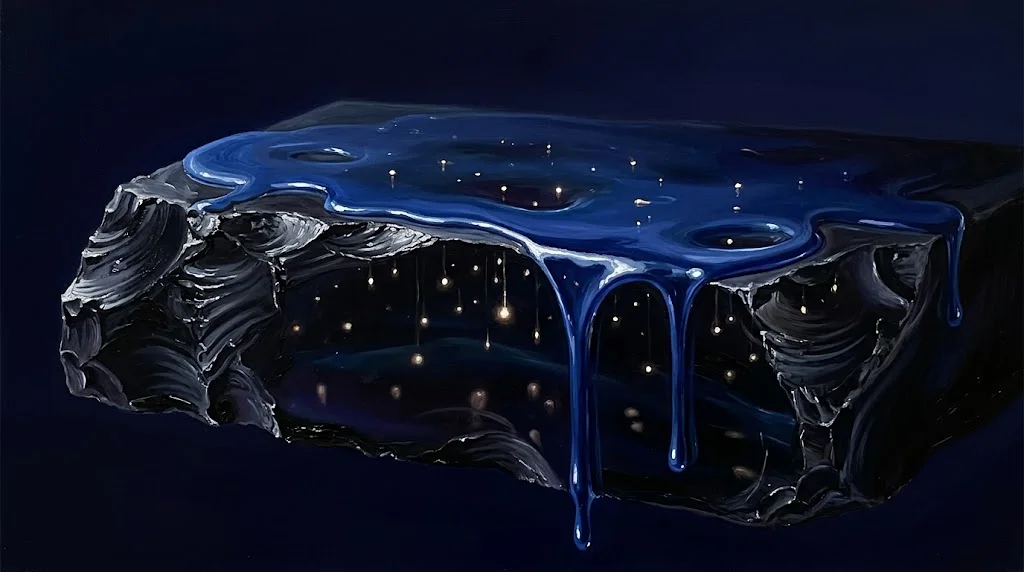 A slab of black obsidian coated in glossy cobalt-blue goo, with small points of light suspended inside it
